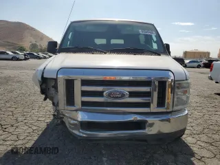 2014 Ford Econoline Passenger XL with VIN 1FBNE3BLXEDA14976, listed as a Copart auction lot 65948404 with 285,655 mi miles and Salvage Title. Bid and sale history available at DreamBid. Image 5.