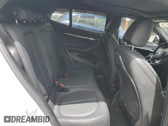 2018 BMW X2 xDrive28i z VIN WBXYJ5C38JEF79686, wystawiony jako Copart lot #56988735 z przebiegiem 103 799 mil mil oraz Szkoda całkowita • Salvage title. Historia ofert i sprzedaży dostępna na DreamBid. Obrazek 10.