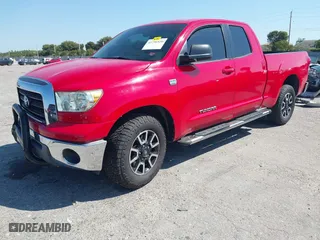 2007 Toyota Tundra SR5 with VIN 5TBRT54187S449859, listed as a IAAI auction lot 41796920 with 153,944 mi miles. Bid and sale history available at carsss.com. Image 2.