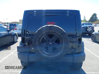 2008 Jeep Wrangler Unlimited Rubicon with VIN 1J8GA69108L574773, listed as a IAAI auction lot 42714300 with 106,974 mi miles and . Bid and sale history available at DreamBid. Image 16.