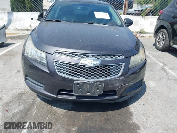 2014 Chevrolet Cruze LS z VIN 1G1PA5SG1E7405326, wystawiony jako IAAI lot #42095319 z przebiegiem Nie podano mil oraz . Historia ofert i sprzedaży dostępna na DreamBid. Obrazek 11.