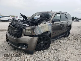2016 GMC Yukon Denali with VIN 1GKS1CKJ6GR241889, listed as a Copart auction lot 67661734 with 0 mi miles and Salvage Title. Bid and sale history available at carsss.com. Image 1.