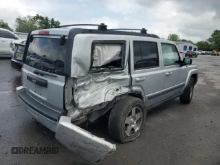 2009 Jeep Commander Sport z VIN 1J8HG48K29C531877, wystawiony jako Copart lot #58708825 z przebiegiem 198 585 mil mil oraz Szkoda całkowita • Salvage title. Historia ofert i sprzedaży dostępna na DreamBid. Obrazek 3.