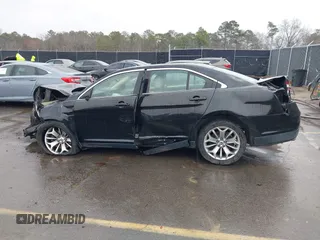 2014 Ford Taurus Limited with VIN 1FAHP2F87EG130532, listed as a IAAI auction lot 41618112 with 118,474 mi miles. Bid and sale history available at carsss.com. Image 14.