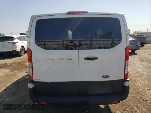 2019 Ford Transit with VIN 1FTYE1YM4KKB77840, listed as a Copart auction lot 70328604 with 264,882 mi miles and Salvage title. Bid and sale history available at DreamBid. Image 6.