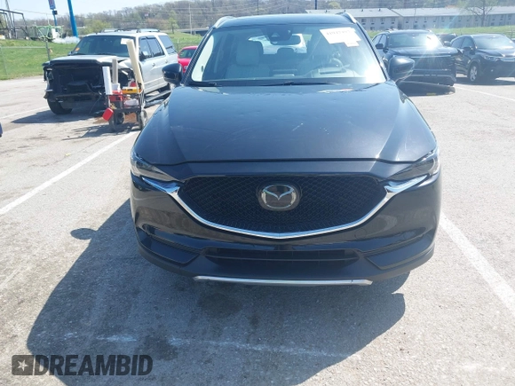 2018 Mazda CX-5 Grand Touring with VIN JM3KFADM2J1324547, listed as a IAAI auction lot 41947497 with 66,254 mi miles. Bid and sale history available at carsss.com. Image 12.
