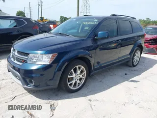 2014 Dodge Journey SXT with VIN 3C4PDCBG3ET218328, listed as a IAAI auction lot 42086656 with 55,620 mi miles. Bid and sale history available at carsss.com. Image 2.