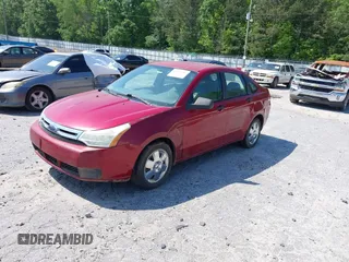 2009 Ford Focus S with VIN 1FAHP34N69W102568, listed as a IAAI auction lot 42137185 with 113,099 mi miles. Bid and sale history available at carsss.com. Image 2.