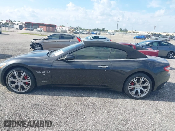2013 Maserati GranTurismo Convertible Sport with VIN ZAM45MMA2D0069786, listed as a IAAI auction lot 40874830 with 37,312 mi miles. Bid and sale history available at carsss.com. Image 14.