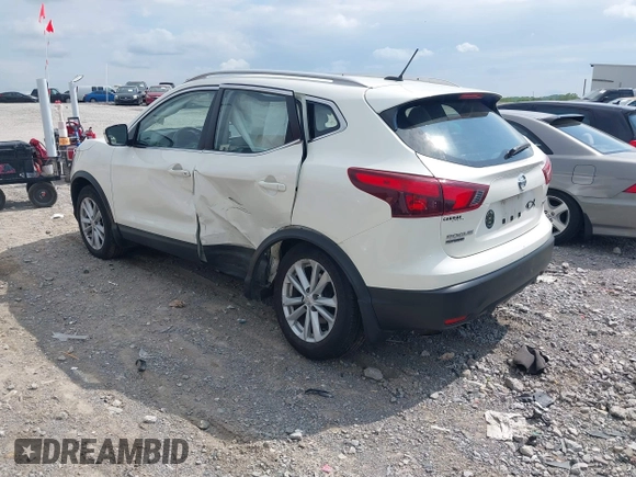 2017 Nissan Rogue SV with VIN JN1BJ1CR3HW100711, listed as a IAAI auction lot 42157090 with 106,067 mi miles and . Bid and sale history available at DreamBid. Image 3.