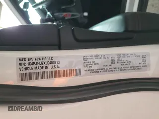 2020 Jeep Grand Cherokee Trailhawk with VIN 1C4RJFLGXLC400313, listed as a Copart auction lot 53649565 with 51,717 mi miles and Salvage title. Bid and sale history available at DreamBid. Image 12.