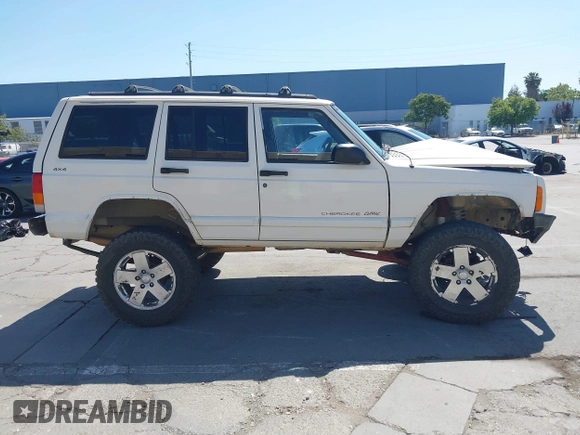 1998 Jeep Cherokee Sport with VIN 1J4FJ68S4WL227094, listed as a IAAI auction lot 42361950 with Not provided miles and . Bid and sale history available at DreamBid. Image 13.