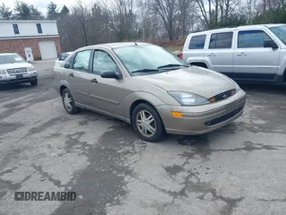 2003 Ford Focus SE z VIN 1FAFP34Z33W226606, wystawiony jako IAAI lot #41813361 z przebiegiem 218 046 mil mil oraz . Historia ofert i sprzedaży dostępna na DreamBid. Obrazek 1.