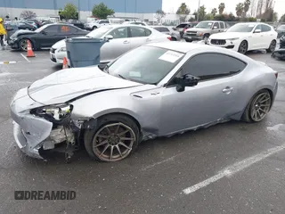 2016 Scion FR-S with VIN JF1ZNAA1XG8709798, listed as a IAAI auction lot 41713314 with 139,450 mi miles. Bid and sale history available at carsss.com. Image 18.