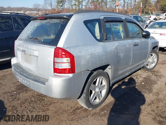 2007 Jeep Compass Sport with VIN 1J8FF47W47D396942, listed as a IAAI auction lot 41403901 with 999,999 mi miles. Bid and sale history available at carsss.com. Image 4.