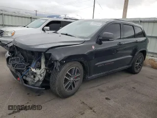 2017 Jeep Grand Cherokee Trailhawk with VIN 1C4RJFLT5HC692439, listed as a Copart auction lot 81093534 with 135,493 mi miles and Salvage title. Bid and sale history available at DreamBid. Image 1.