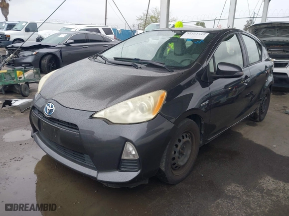 2012 Toyota Prius c One with VIN JTDKDTB30C1024951, listed as a IAAI auction lot 41732332 with 190,495 mi miles. Bid and sale history available at carsss.com. Image 18.