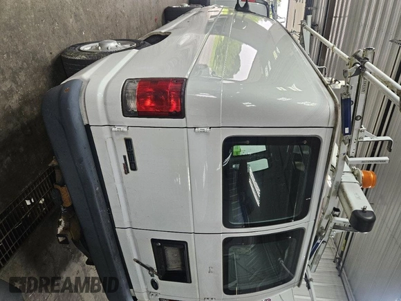 2013 Ford Econoline Cargo Commercial with VIN 1FTNE1EW6DDB01438, listed as a IAAI auction lot 42737683 with 125,160 mi miles and . Bid and sale history available at DreamBid. Image 15.