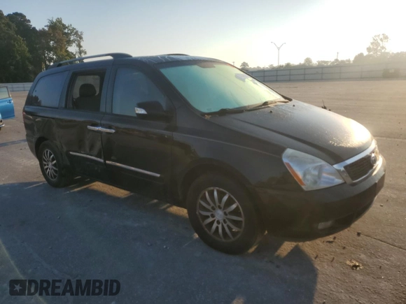 2011 Kia Sedona EX with VIN KNDMH4C73B6387198, listed as a Copart auction lot 74748064 with 172,437 mi miles and Salvage Title. Bid and sale history available at carsss.com. Image 4.