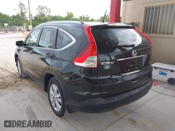 2012 Honda CR-V EX-L with VIN JHLRM3H71CC006913, listed as a IAAI auction lot 42021010 with 173,470 mi miles. Bid and sale history available at carsss.com. Image 3.
