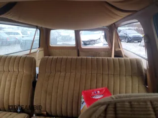1990 GMC Suburban z VIN 1GKGR26K8LF528125, wystawiony jako Copart lot #84931724 z przebiegiem Nie podano mil oraz Szkody całkowita. Historia ofert i sprzedaży dostępna na DreamBid. Obrazek 10.