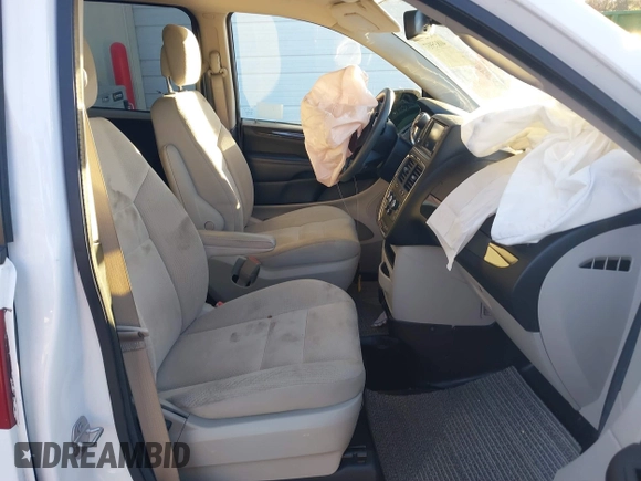 2019 Dodge Grand Caravan SE with VIN 2C7WDGBG7KR803126, listed as a IAAI auction lot 40835937 with 63,100 mi miles and . Bid and sale history available at DreamBid. Image 5.