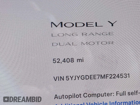 2021 Tesla Model Y Long Range with VIN 5YJYGDEE7MF224531, listed as a IAAI auction lot 38454442 with 52,408 mi miles. Bid and sale history available at carsss.com. Image 16.