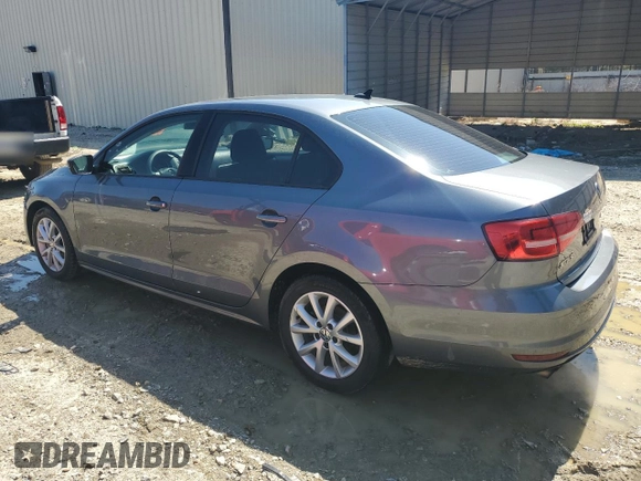 2015 Volkswagen Jetta SE with VIN 3VWD17AJXFM259533, listed as a Copart auction lot 52295555 with 170,886 mi miles and Salvage title. Bid and sale history available at DreamBid. Image 2.