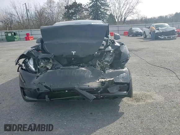 2022 Tesla Model Y Long Range with VIN 7SAYGAEE3NF310888, listed as a Copart auction lot 51361465 with Not Provided miles and Salvage Title. Bid and sale history available at carsss.com. Image 10.