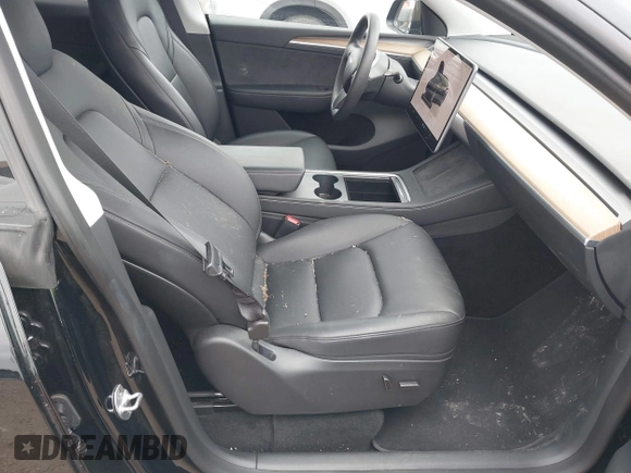 2023 Tesla Model Y Long Range with VIN 7SAYGDEEXPA044335, listed as a IAAI auction lot 42350159 with 26,731 mi miles and . Bid and sale history available at DreamBid. Image 5.