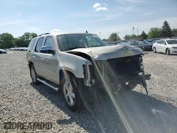 2014 Chevrolet Tahoe LTZ with VIN 1GNSKCE03ER201981, listed as a Copart auction lot 56421125 with 173,710 mi miles and Salvage title. Bid and sale history available at DreamBid. Image 14.