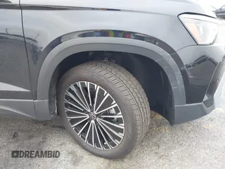2025 Volkswagen Taos z VIN 3VVSC7B22SM011056, wystawiony jako IAAI lot #41889662 z przebiegiem 75 mil mil oraz . Historia ofert i sprzedaży dostępna na DreamBid. Obrazek 22.