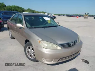 2006 Toyota Camry STD with VIN 4T1BE30K76U704819, listed as a IAAI auction lot 42021982 with 264,934 mi miles and . Bid and sale history available at carsss.com. Image 6.