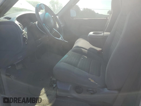 2003 Ford F-150 XL with VIN 1FTRF07223KC28264, listed as a Copart auction lot 61012594 with Not provided miles and Clean title. Bid and sale history available at DreamBid. Image 7.