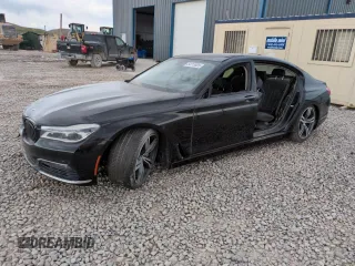 2017 BMW 7 Series 750i z VIN WBA7F0C35HGM21697, wystawiony jako Copart lot #54713825 z przebiegiem Nie podano mil oraz Szkoda całkowita • Salvage title. Historia ofert i sprzedaży dostępna na DreamBid. Obrazek 1.