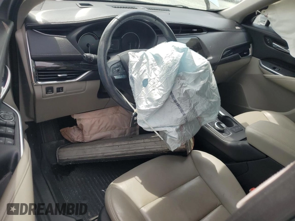 2021 Cadillac XT4 FWD Premium Luxury z VIN 1GYFZCR40MF000293, wystawiony jako Copart lot #58710565 z przebiegiem 49 721 mil mil oraz Szkoda całkowita • Salvage title. Historia ofert i sprzedaży dostępna na DreamBid. Obrazek 8.