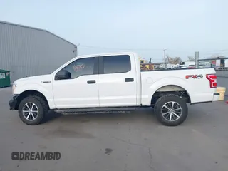 2019 Ford F-150 XL with VIN 1FTEW1EP8KKE13811, listed as a IAAI auction lot 41769452 with 133,146 mi miles and . Bid and sale history available at DreamBid. Image 14.
