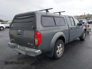 2007 Nissan Frontier SE with VIN 1N6AD09W17C408755, listed as a IAAI auction lot 41958819 with 218,530 mi miles. Bid and sale history available at carsss.com. Image 4.
