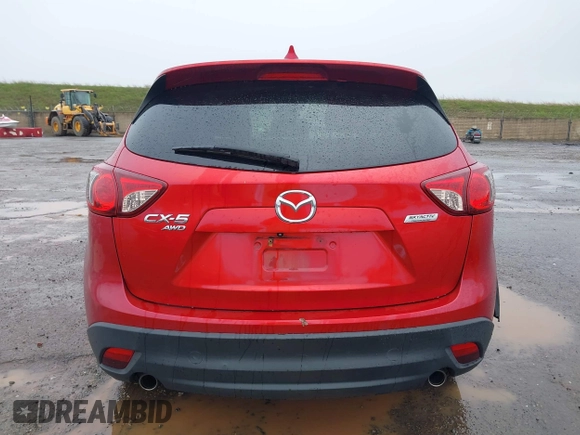 2015 Mazda CX-5 Grand Touring with VIN JM3KE4DY6F0501072, listed as a IAAI auction lot 41534176 with 90,160 mi miles. Bid and sale history available at carsss.com. Image 16.