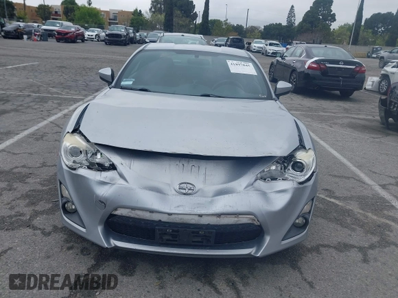 2016 Scion FR-S with VIN JF1ZNAA11G8702268, listed as a IAAI auction lot 41897845 with 133,750 mi miles. Bid and sale history available at carsss.com. Image 12.