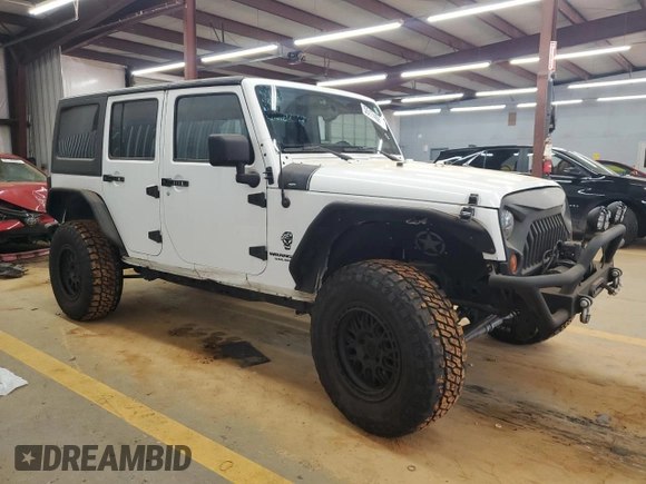 2012 Jeep Wrangler Unlimited Sport z VIN 1C4BJWDG4CL140250, wystawiony jako Copart lot #55174665 z przebiegiem 91 285 mil mil oraz Szkoda całkowita • Salvage title. Historia ofert i sprzedaży dostępna na DreamBid. Obrazek 4.