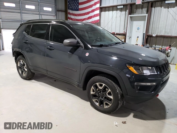 2018 Jeep Compass Trailhawk with VIN 3C4NJDDB4JT184997, listed as a Copart auction lot 48943005 with 119,778 mi miles and Salvage title. Bid and sale history available at DreamBid. Image 4.