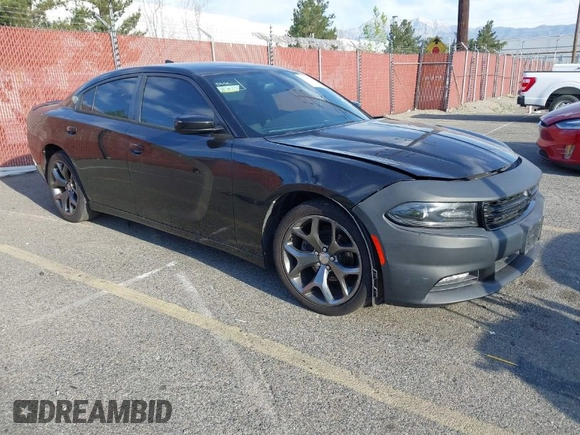 2015 Dodge Charger SXT with VIN 2C3CDXHG9FH915191, listed as a IAAI auction lot 41850427 with 164,535 mi miles and . Bid and sale history available at DreamBid. Image 1.