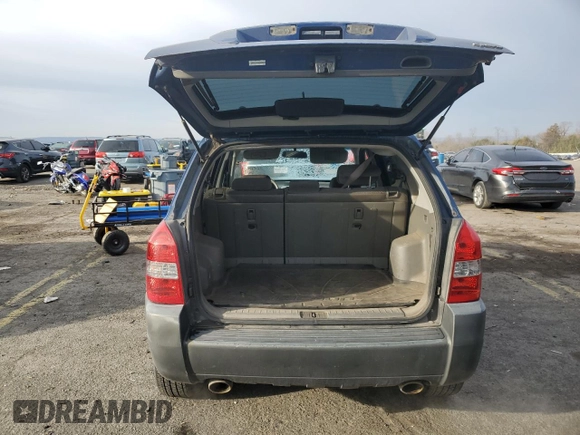 2009 Hyundai Tucson SE with VIN KM8JN72D79U113802, listed as a Copart auction lot 83455074 with 201,936 mi miles and Clean Title. Bid and sale history available at carsss.com. Image 6.