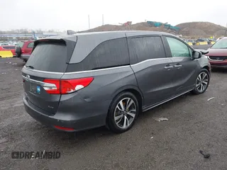 2019 Honda Odyssey Elite with VIN 5FNRL6H91KB048535, listed as a IAAI auction lot 40906579 with 37,322 mi miles and . Bid and sale history available at DreamBid. Image 4.