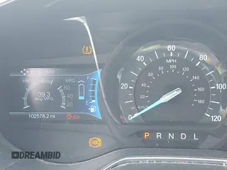2014 Ford Fusion SE Hybrid z VIN 3FA6P0LU3ER391680, wystawiony jako IAAI lot #42643934 z przebiegiem 102 578 mil mil oraz . Historia ofert i sprzedaży dostępna na DreamBid. Obrazek 7.
