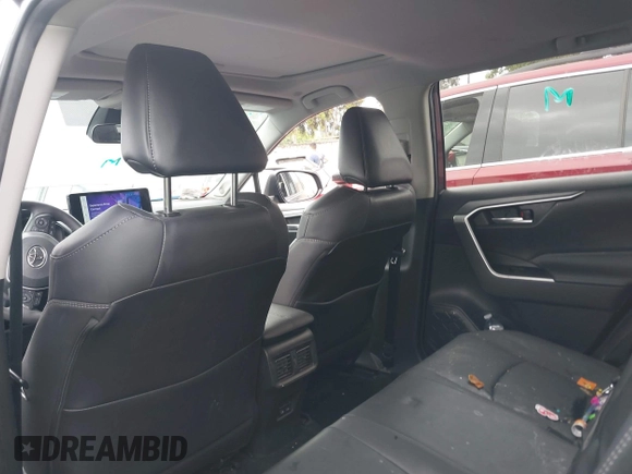 2023 Toyota RAV4 Hybrid XLE Premium with VIN 4T3B6RFV9PU117919, listed as a IAAI auction lot 42528322 with 27,236 mi miles and . Bid and sale history available at DreamBid. Image 20.