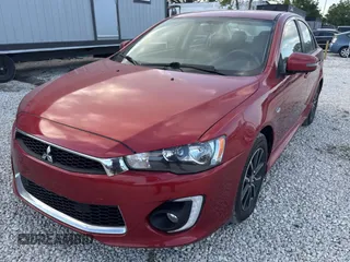 2016 Mitsubishi Lancer SE with VIN JA32V2FW5GU013006, listed as a Copart auction lot 55860815 with 122,815 mi miles and Clean Title. Bid and sale history available at carsss.com. Image 2.