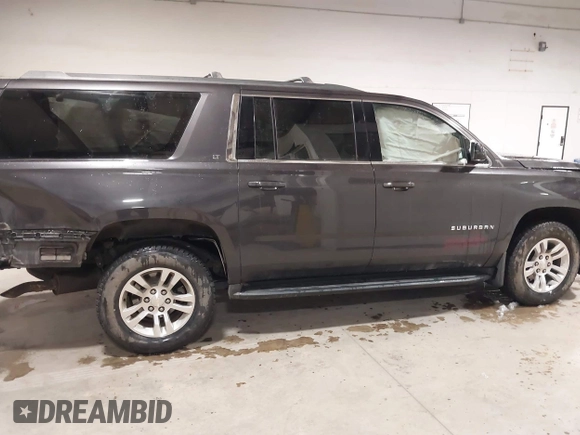 2018 Chevrolet Suburban LT z VIN 1GNSKHKC7JR173463, wystawiony jako IAAI lot #41640353 z przebiegiem Nie podano mil oraz . Historia ofert i sprzedaży dostępna na DreamBid. Obrazek 13.
