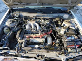 1990 Toyota Camry z VIN 4T1VV21EXLU008760, wystawiony jako Copart lot #88344665 z przebiegiem 154 971 mil mil oraz Nie do naprawy • Non repairable. Historia ofert i sprzedaży dostępna na DreamBid. Obrazek 11.